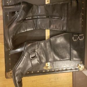 Black leather heeled boots with cuff and buckles